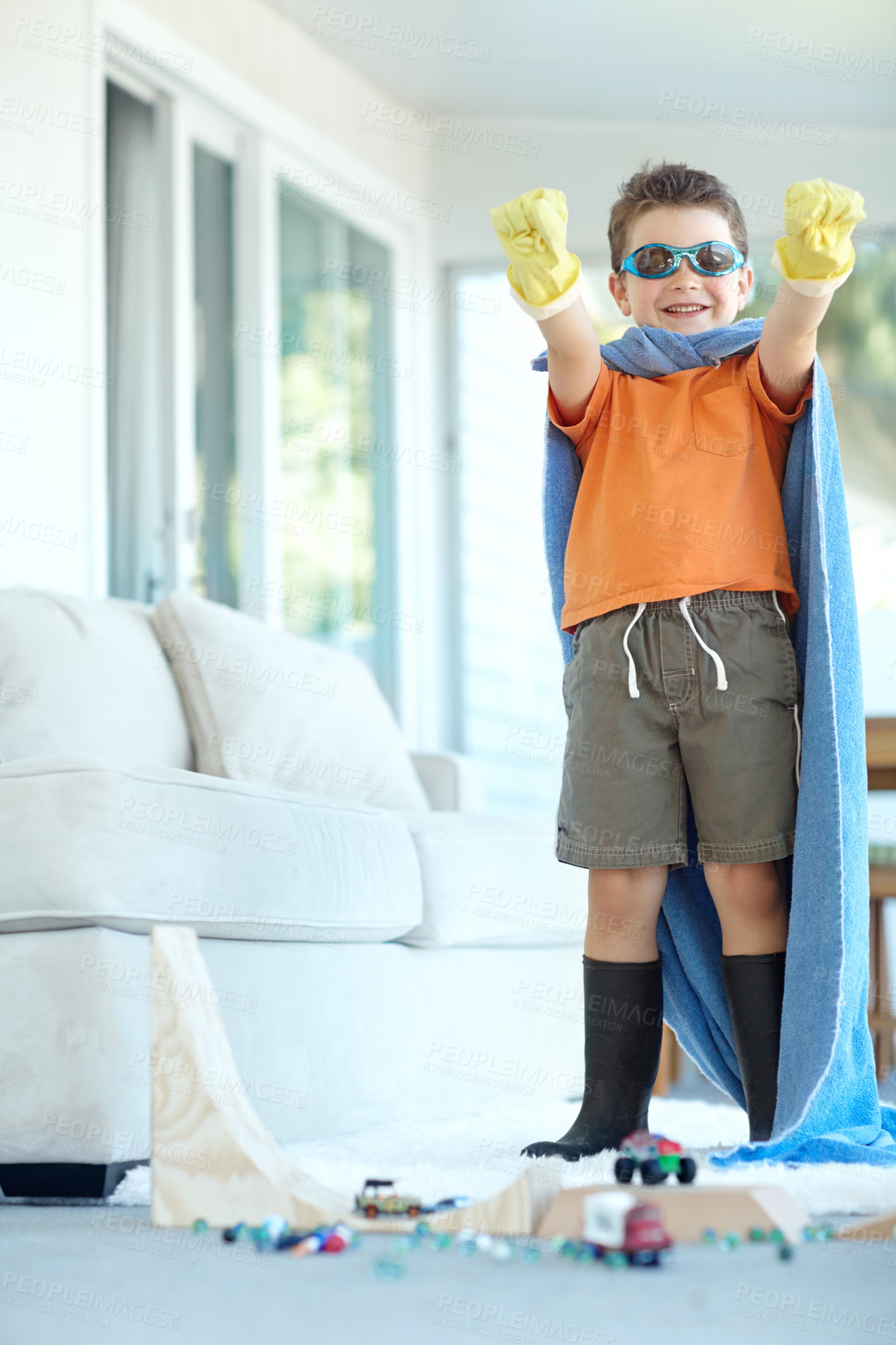 Buy stock photo Home, boy and excited with costume as superhero for fantasy, child growth and development. Male person, kid and happy or smile in living room with outfit for playing with fun, dressup and imagination