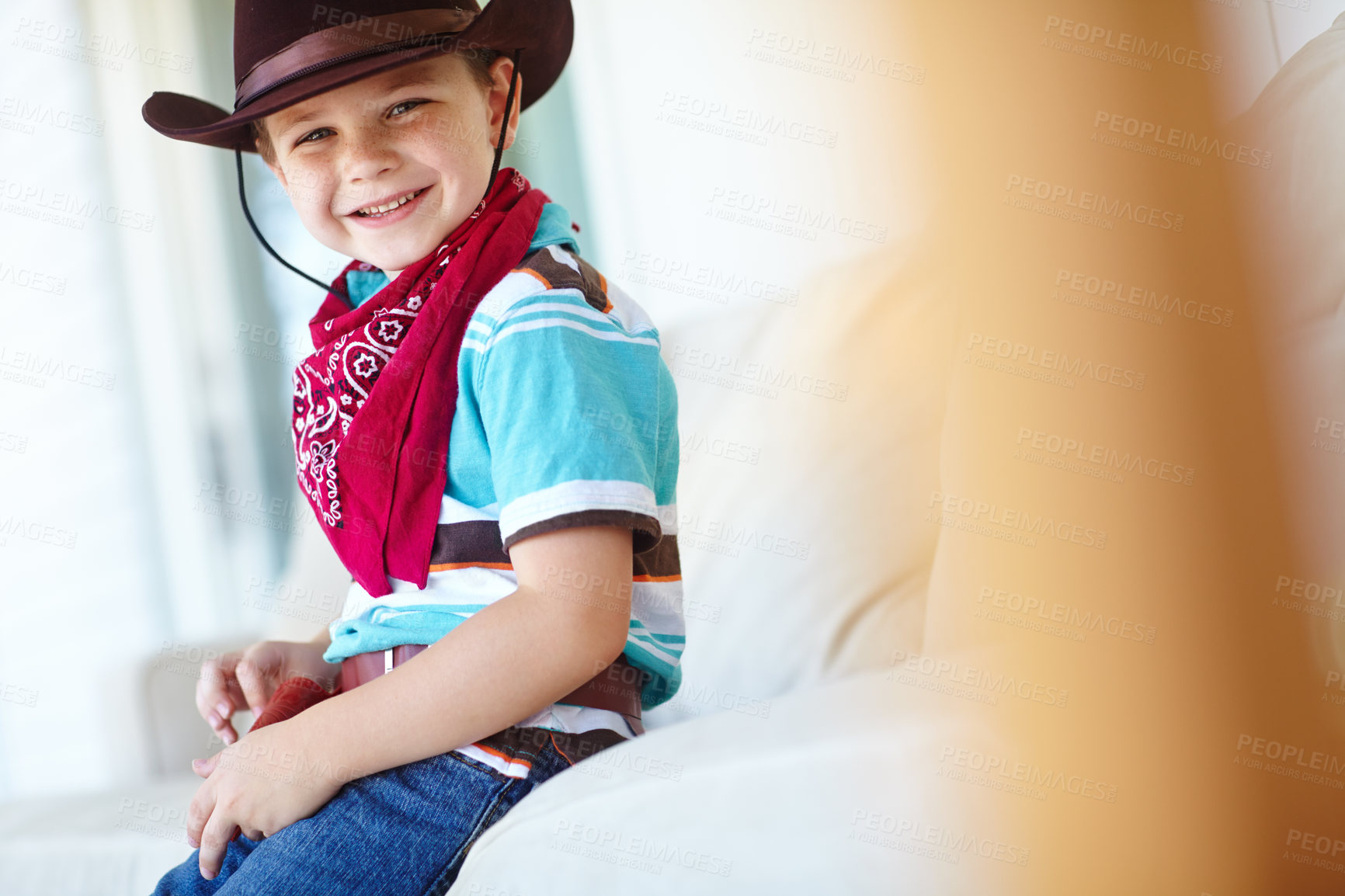 Buy stock photo Home, cowboy or child in portrait with character, childhood and dress up for halloween concert. House, happy kid and fantasy theme with vintage fashion for role development, cosplay or pride in Texas