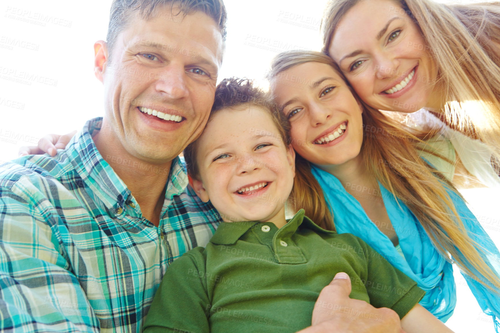 Buy stock photo Portrait, outdoor and parents with siblings, hug and bonding together with smile, nature and love. Face, family and mother with father, kids and children in park, break and adventure with light