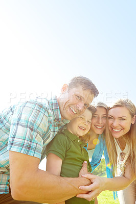 Buy stock photo Outdoor, children and portrait of parents, nature and bonding in park, smile and hug of family in space. Mockup, mom and dad with kids, relax or happy in weekend, woman and man with youth or together