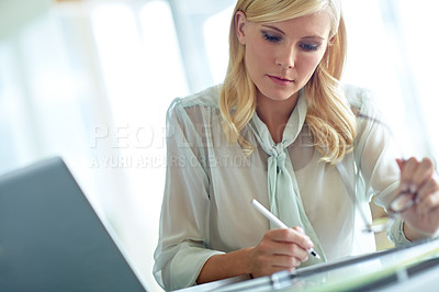 Buy stock photo Receptionist, office and business woman writing notes for schedule, appointment or booking. Secretary, pen or employee planning in workplace for administration, agenda or research startup information