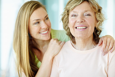 Buy stock photo Portrait, mature mother and daughter with smile, morning bonding and embrace in living room together. Relax, senior mom and confident girl with happy face for love, care and support in family home