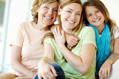 Buy stock photo Hug, happy child and mom with grandmother in portrait for family generations, love and bonding together. Face, grandparent and girl embrace mother for support, care and smile with women at home in UK