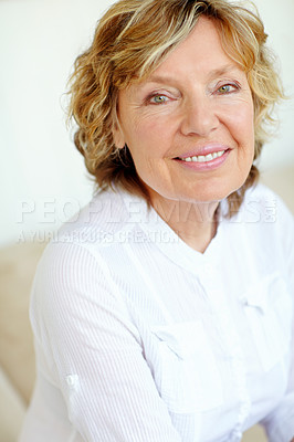 Buy stock photo Portrait, senior woman and happy in home to relax, break and chilling for retirement. Female person, pensioner and smile or satisfied with confidence on sofa in living room for positivity and day off