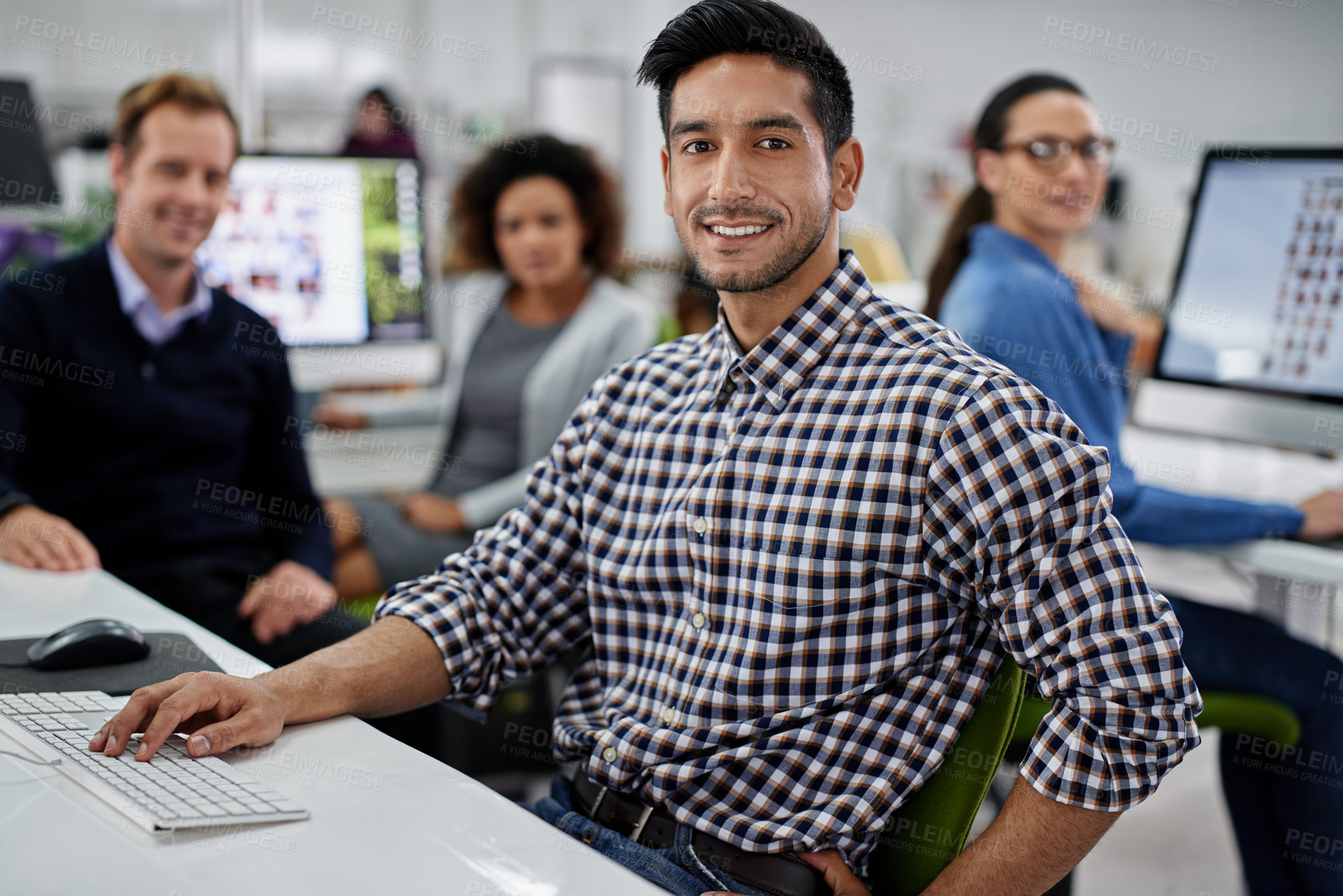 Buy stock photo Portrait, man and people with smile at office for career, company and job growth as graphic designer. Computer, employee and happy with confidence with teamwork, collaboration and research or project