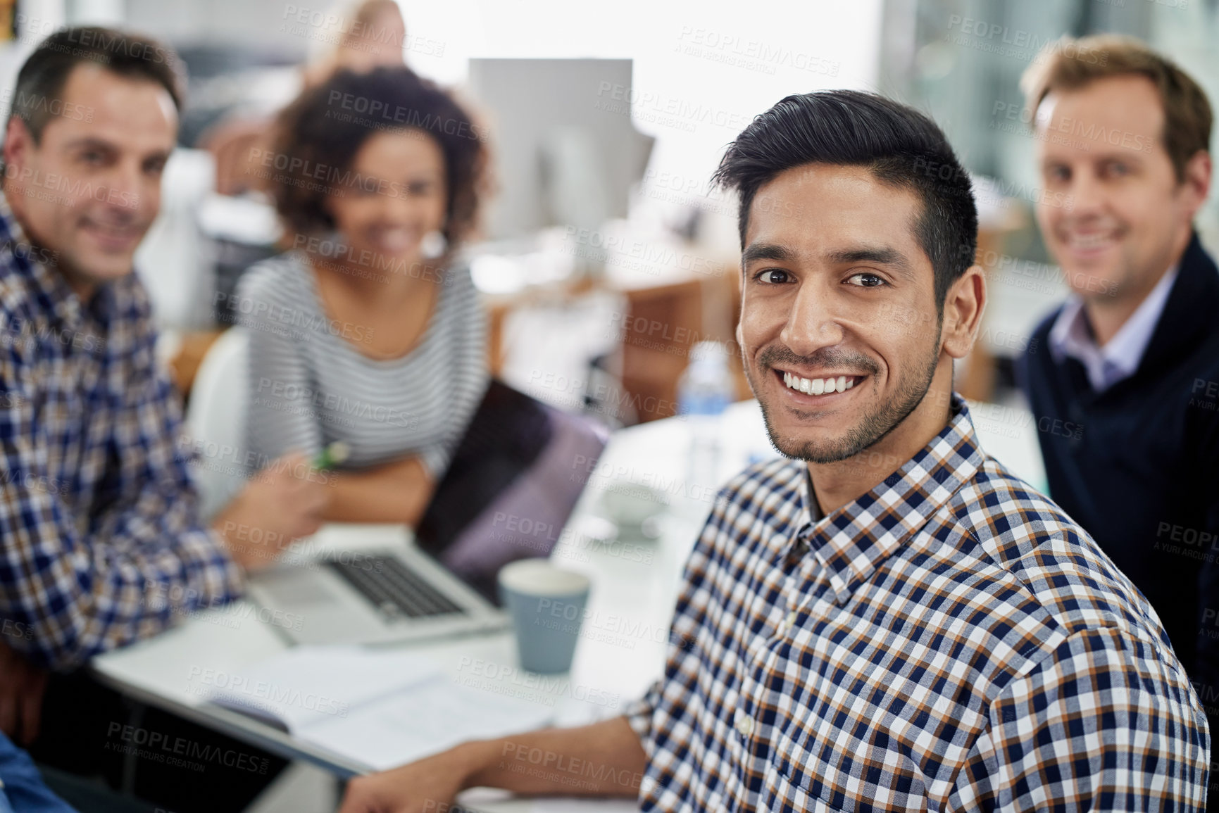 Buy stock photo Coworking, meeting and portrait of creative businessman with teamwork on project with research. Group, collaboration and employees at desk editing news, article or planning magazine media with info