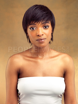 Buy stock photo Portrait, glow and black woman in studio, skincare and cosmetics for beauty, routine and aesthetic. Gold background, dermatology and results of treatment in skin, face and body for African person