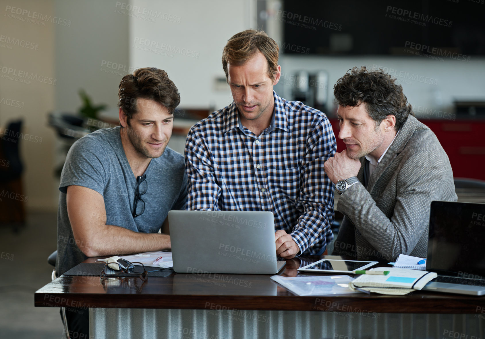 Buy stock photo Man, team and laptop or office desk, meeting and collaboration for teamwork and thinking for online project. Employee, together and research on tech for info, coworking and reading company review