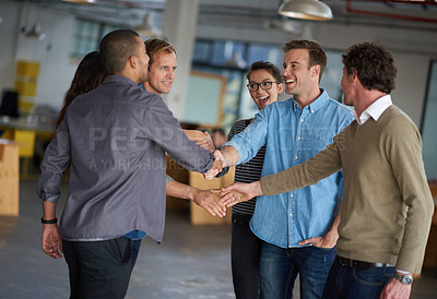 Buy stock photo Two groups of professional greeting and shaking hands
