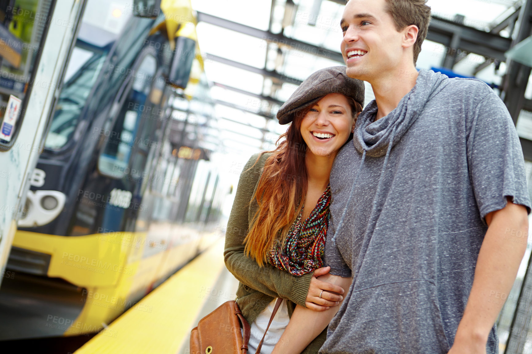 Buy stock photo Couple, travel and journey at train station for holiday, journey or London adventure. Man, woman and holding hands with love, smile and honeymoon with public transport and vacation or tourism