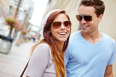 Buy stock photo A stylish couple walking on the street with copyspace
