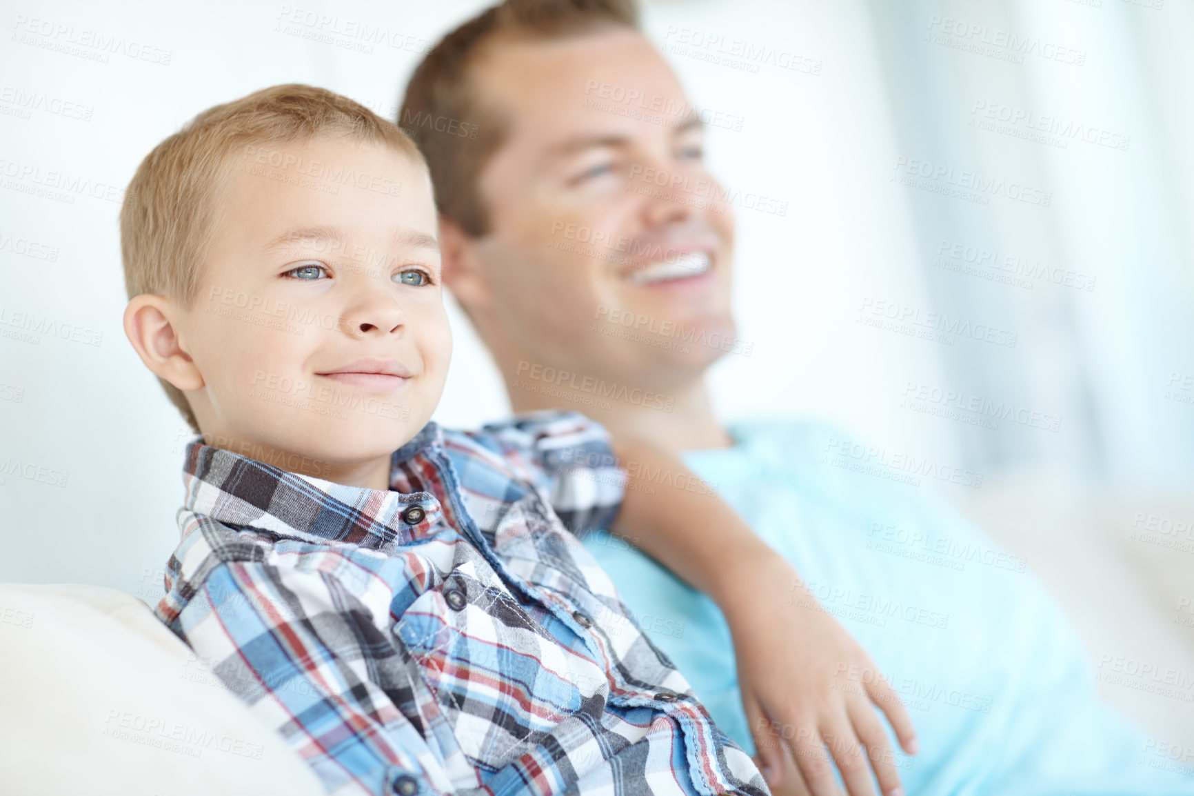 Buy stock photo Thinking, father and son relax at house for safety, bonding together and love of relationship care. Happy, man and child with calm morning, weekend break and family support for embracing at apartment