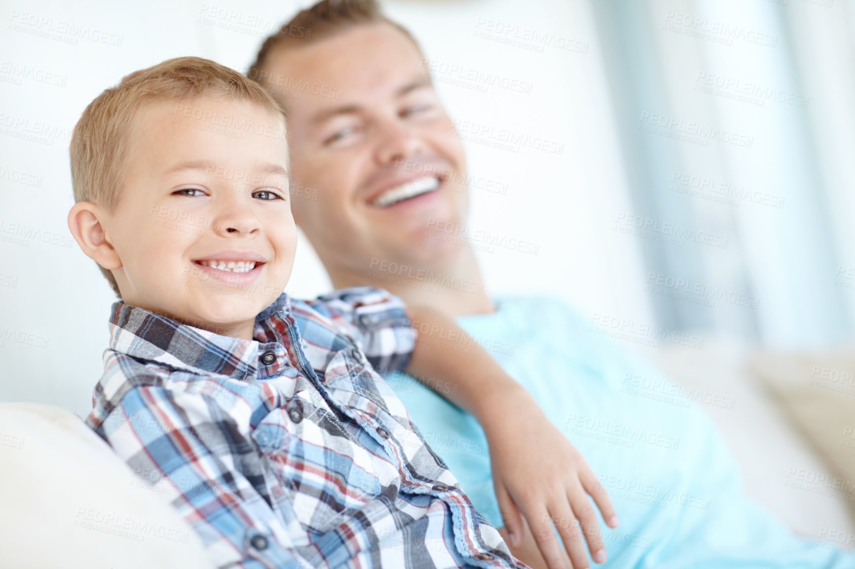 Buy stock photo Thinking, father and child relaxing at house for safety, bonding together and love of relationship care. Happy, man and son for calm morning, weekend break and family support of embrace at apartment