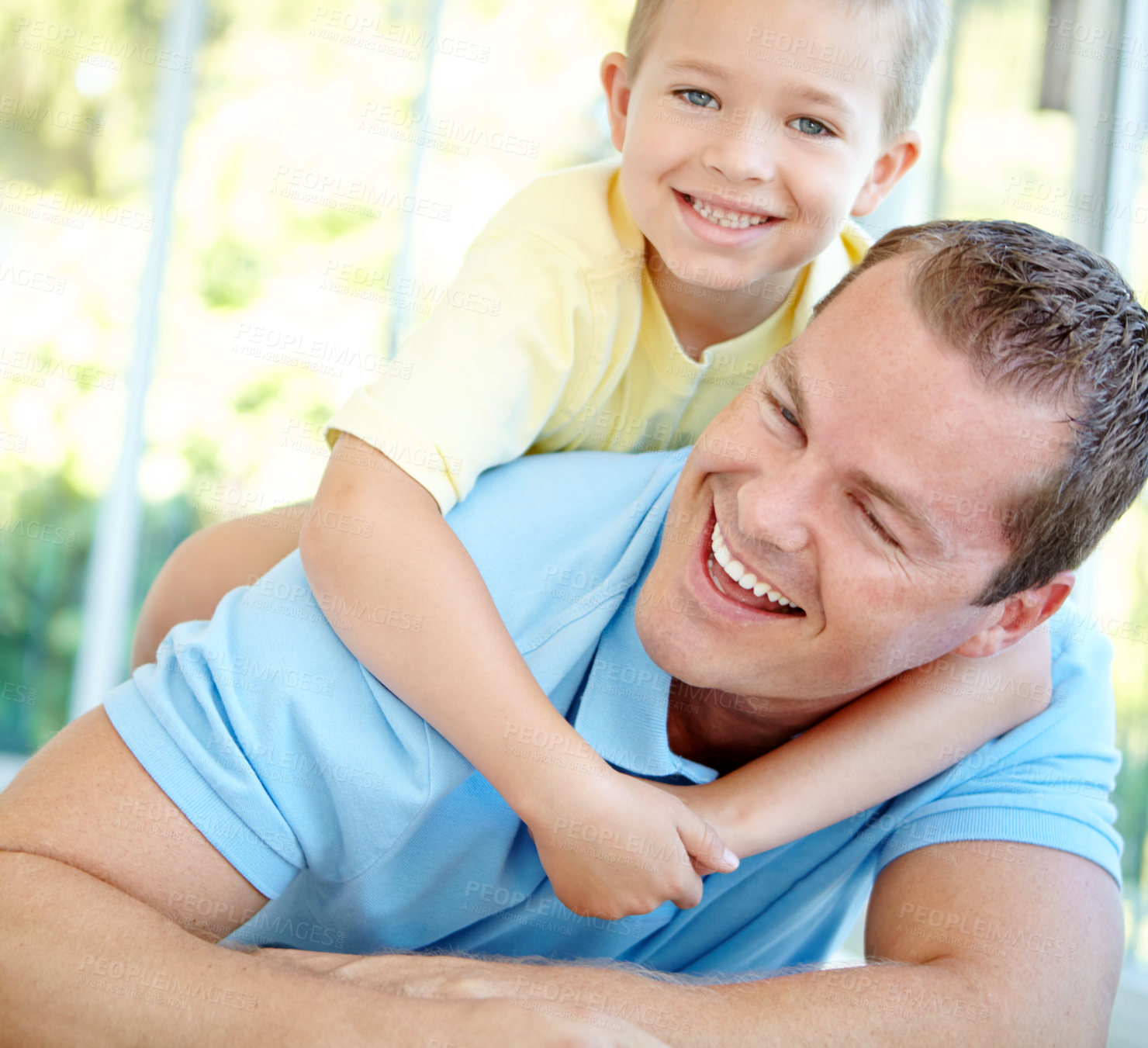 Buy stock photo Happy, dad and child playing in family home with fun, bonding and love in living room. Smile, wrestle and youth with parent care, support and laugh from game with hug and embrace on the floor