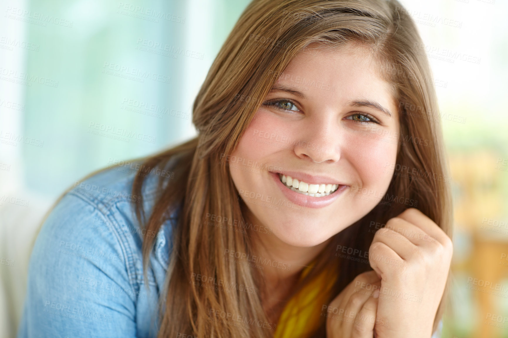 Buy stock photo Girl, portrait and teenager relax in home, peace and confident adolescent in living room. Female person, comfortable kid and proud smile on weekend in apartment, resting and morning satisfaction