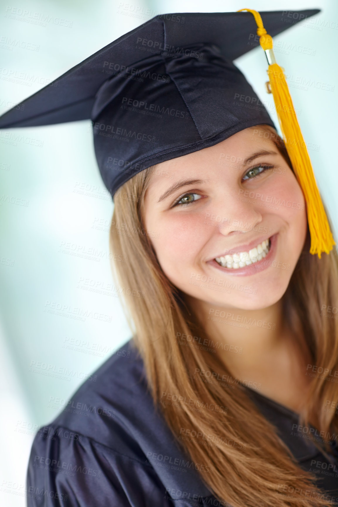 Buy stock photo University, graduation and portrait of woman with smile for learning, success and course achievement. Student, cap and person with confidence in gown for education qualification, knowledge and future