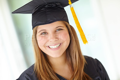 Buy stock photo University, happy and portrait of woman at graduation for learning, knowledge and course achievement. Student, cap and person with confidence in gown for education qualification, future and success