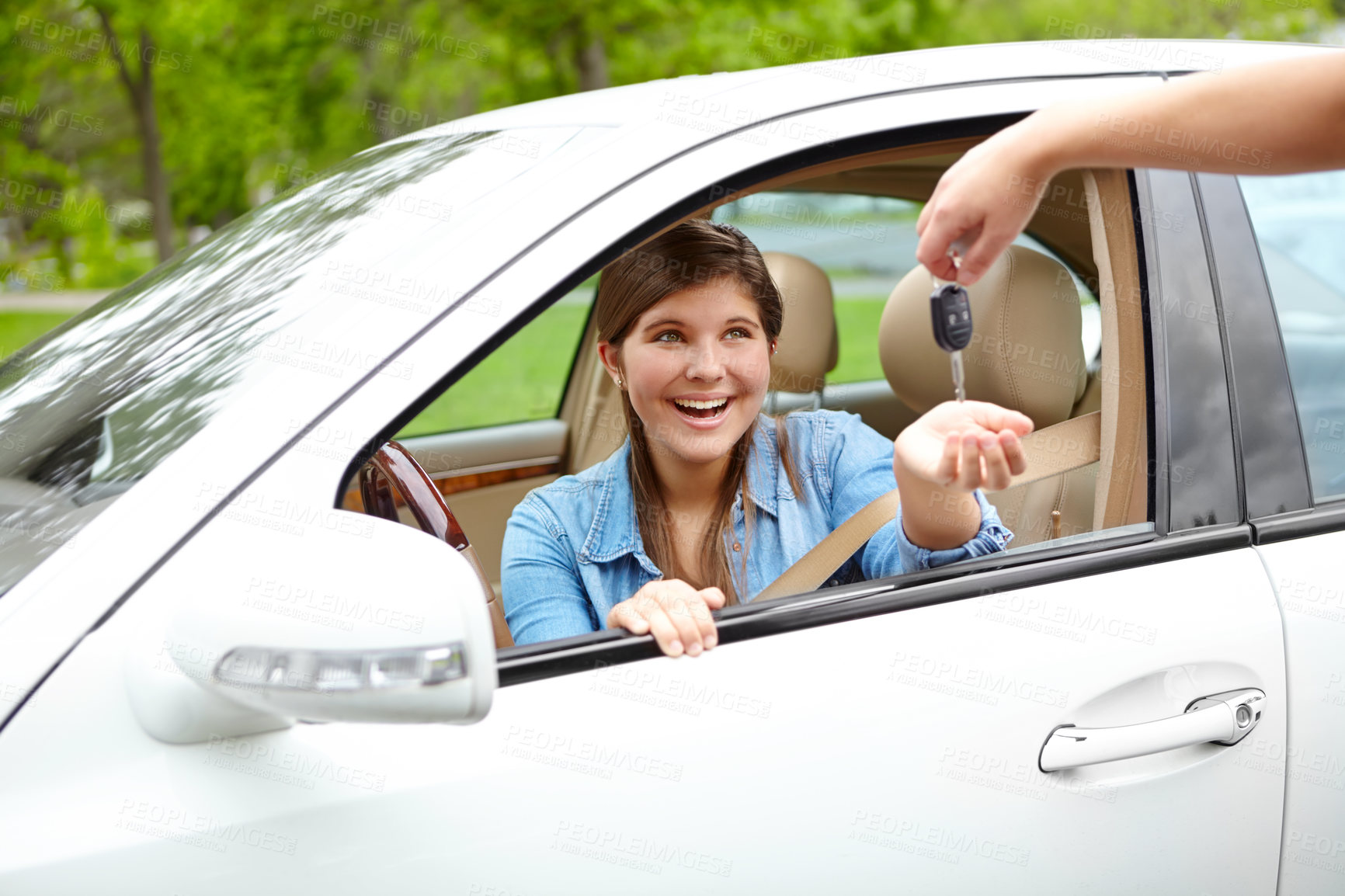 Buy stock photo Excited girl, car or surprise with keys for license, asset or vehicle privileges in neighborhood. Young, female person or driver with smile by window for transport service, commute or motor ownership