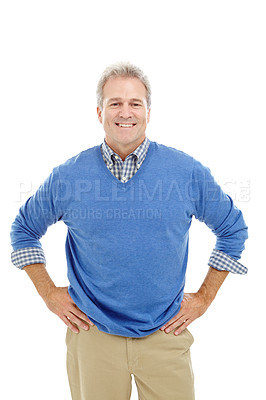 Buy stock photo Studio portrait of an attrative, mature man standing with his hands on his hips and smiling widely