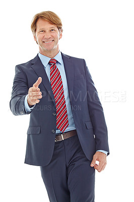 Buy stock photo Studio portrait of a mature businessman extending his arm to shake hands