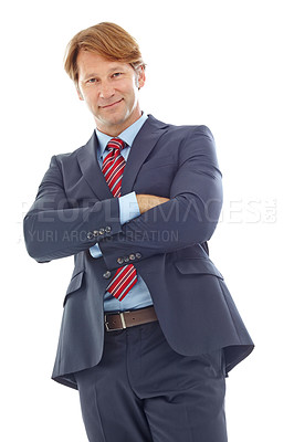 Buy stock photo Studio portrait of a confident mature businessman standing with his arms crossed isolated on white