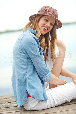 Buy stock photo Woman, lake and smile with adventure, portrait and relax for holiday, vacation or happy on travel journey. Girl, tourist and dock with calm in nature, environment or sightseeing by water in Denmark