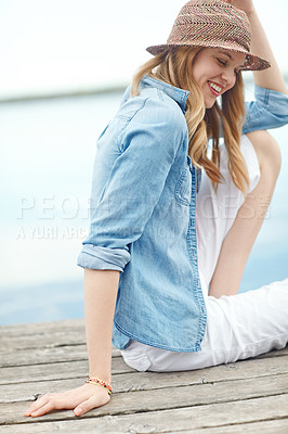 Buy stock photo Woman, lake and smile with holiday, thinking and relax for adventure, vacation or happy on travel journey. Girl, tourist and dock with calm in nature, environment or sightseeing by water in Denmark