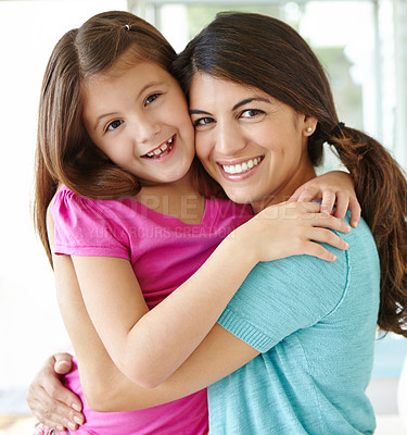 Buy stock photo Happy mom, portrait and hug child in family home for love, care or laugh together to relax. Face, mother and embrace girl for support, connection or safety of daughter with single parent in Finland