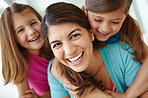 Sharing playful laughs with her daughters