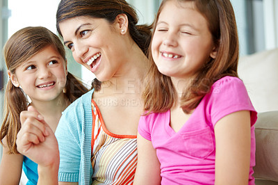 Buy stock photo Happy, children and playing with woman in home for development, support and connection on weekend. Family, care and girl kids with smile by mother in house for love, relaxing and bonding together