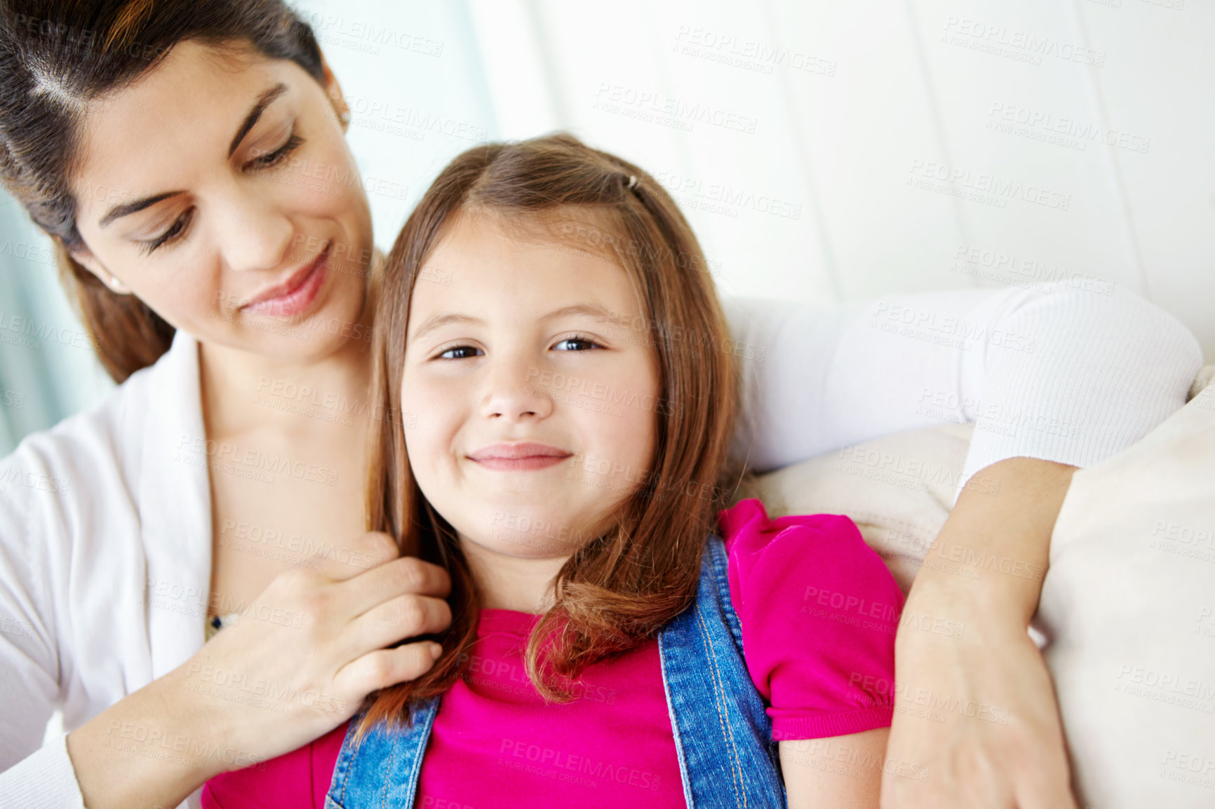 Buy stock photo Hug, mom and love for child, lounge and bonding with daughter, calm and comfort for girl and family. Embrace, mother and care for kid, relax and motherhood for woman, adoption and together in home