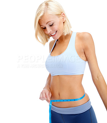 Buy stock photo Woman, happy and tape measure in studio for lose weight, diet and healthy abdomen with wellness. Female person, smile and health progress, fitness and exercise on white background with detox results