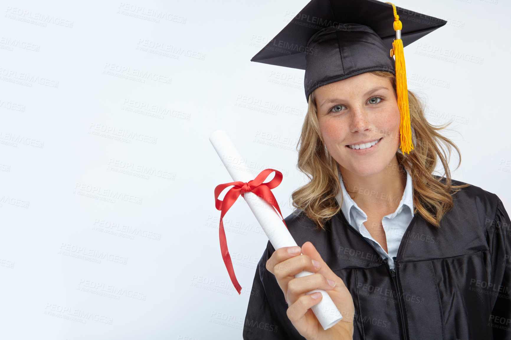 Buy stock photo Graduation, happy and portrait of woman with scroll in studio for university achievement. Mockup space, pride and female graduate with college diploma, degree or certificate by white background.