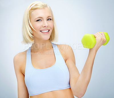 Buy stock photo Exercise, portrait and woman with dumbbell in studio for training challenge, fitness and healthy body. Happy, athlete and person with gym equipment for muscle, strength or workout by white background