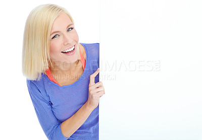 Buy stock photo Blank, poster and portrait of woman in studio with info, smile or deal promo for giveaway opportunity. Billboard, news announcement and girl with mockup sign, card or offer space on white background