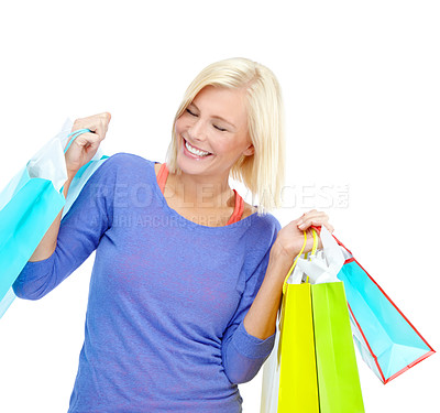 Buy stock photo Happy, smile and woman with shopping bag in studio for retail discount, fashion and commerce. Customer, confident and female person with package for boutique gift, clothes or sale by white background