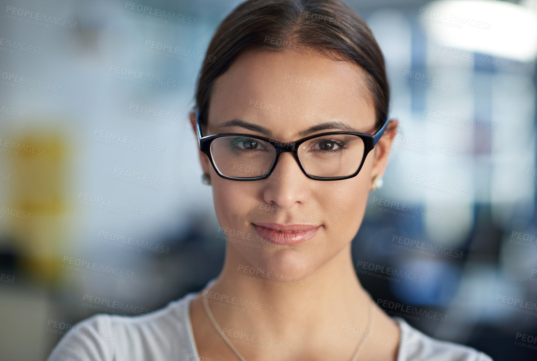 Buy stock photo Cropped closeup of a woman wearing spectacles looking directly at the camera