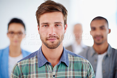 Buy stock photo Smile, portrait and businessman in office with group for unity, collaboration or teamwork. Happy, confident and professional male manager with designers for support and pride in workplace in Canada.