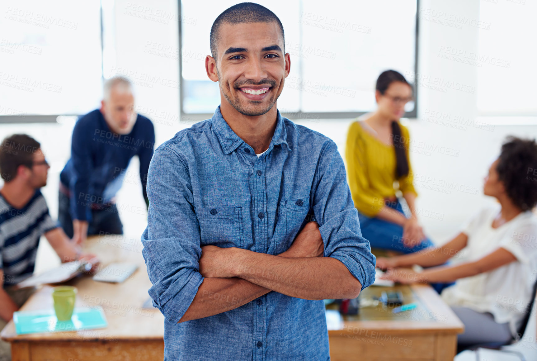 Buy stock photo Businessman, portrait and happy with arms crossed in meeting for creative planning, strategy or leadership. Professional, employees and smile for collaboration, design team or discussion in boardroom