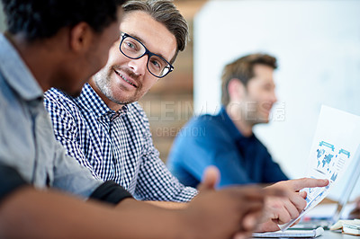 Buy stock photo Two male professionals having a positive conversation in a meeting room