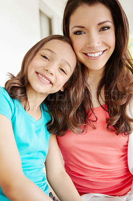 Buy stock photo Portrait of a mother and a daughter smiling at the camera