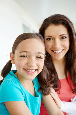 Buy stock photo Mother, kid and portrait on sofa at house with embrace for bonding, love and security of morning gratitude. Smile, girl and woman with affection on weekend, care and support together for childhood