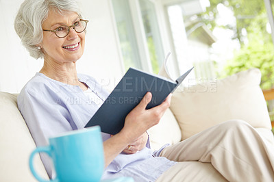 Buy stock photo Elderly woman, thinking and reading book for knowledge in retirement home on weekend on break. Senior, female person and glasses with happiness, planning or idea in living room on couch for education