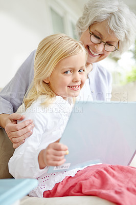 Buy stock photo Girl, senior grandma and fantasy book in home living room with woman, smile and story for retirement on sofa. Happy, elderly person and weekend for rest, family bonding and lounge for memory on couch