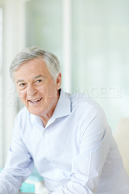 Buy stock photo Portrait, relax and retirement with senior man on sofa in living room of home for comfort or rest. Happy, smile and wellness with face of confident mature person in apartment for weekend time off