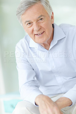 Buy stock photo Portrait, smile and wellness with senior man on sofa in living room of home for comfort or rest. Happy, relax and retirement with face of confident mature person in apartment for weekend time off