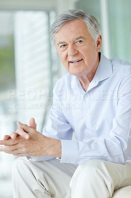 Buy stock photo Happy, portrait and relax with senior man on sofa in living room of home for comfort or rest. Retirement, smile and wellness with face of confident mature person in apartment for weekend time off