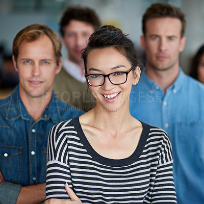 Buy stock photo Group of creative professional smiling at the camera with their arms crossed