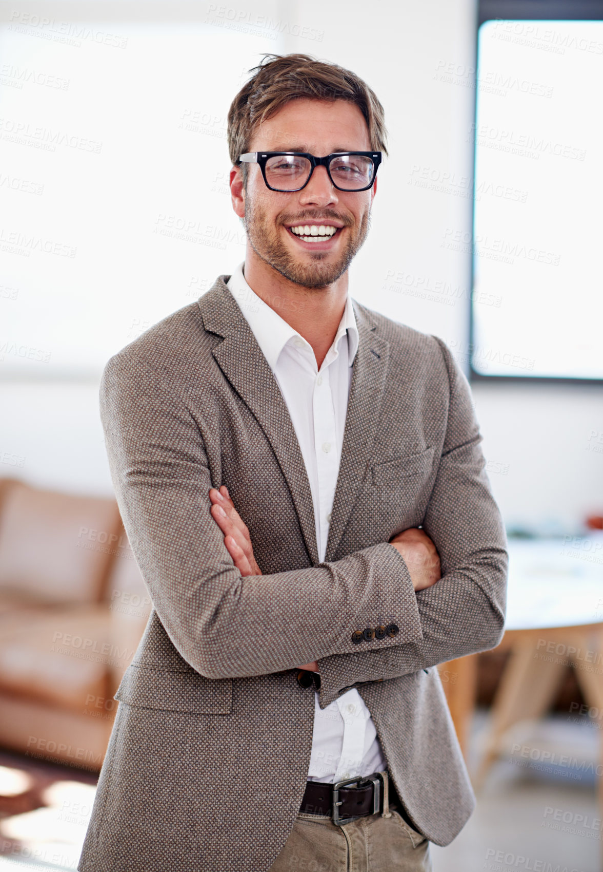 Buy stock photo Portrait of a young man standing in an office