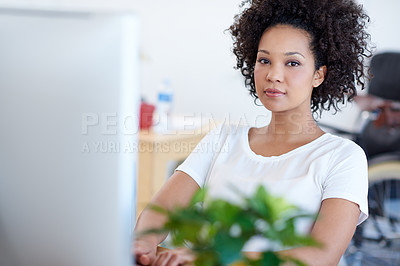 Buy stock photo Portrait, serious or African woman on computer for digital project development or problem solving. Web designer, solution or female person typing on technology in creative agency or startup business